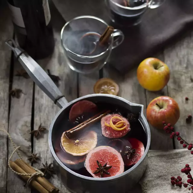 vintner's mulled wine in a pot with spices such as orange, cinnamon and vanilla